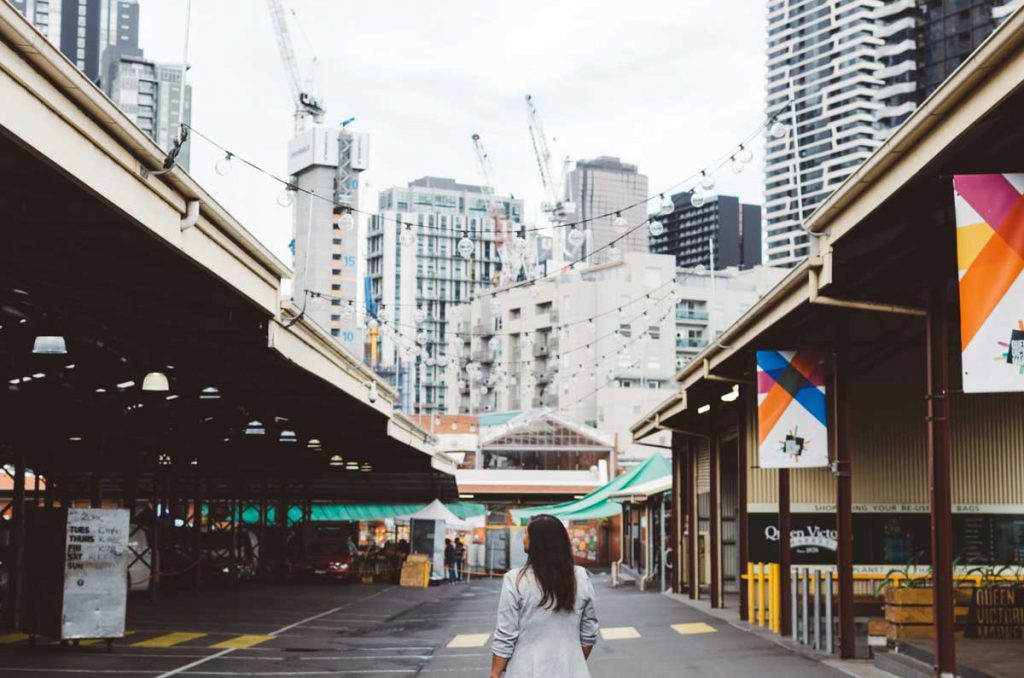 business interruption insurance covid update - woman in empty streets