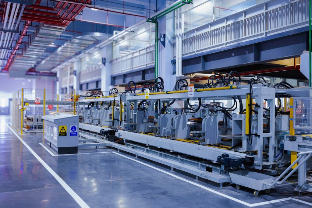 Automated production line machinery inside a large manufacturing facility